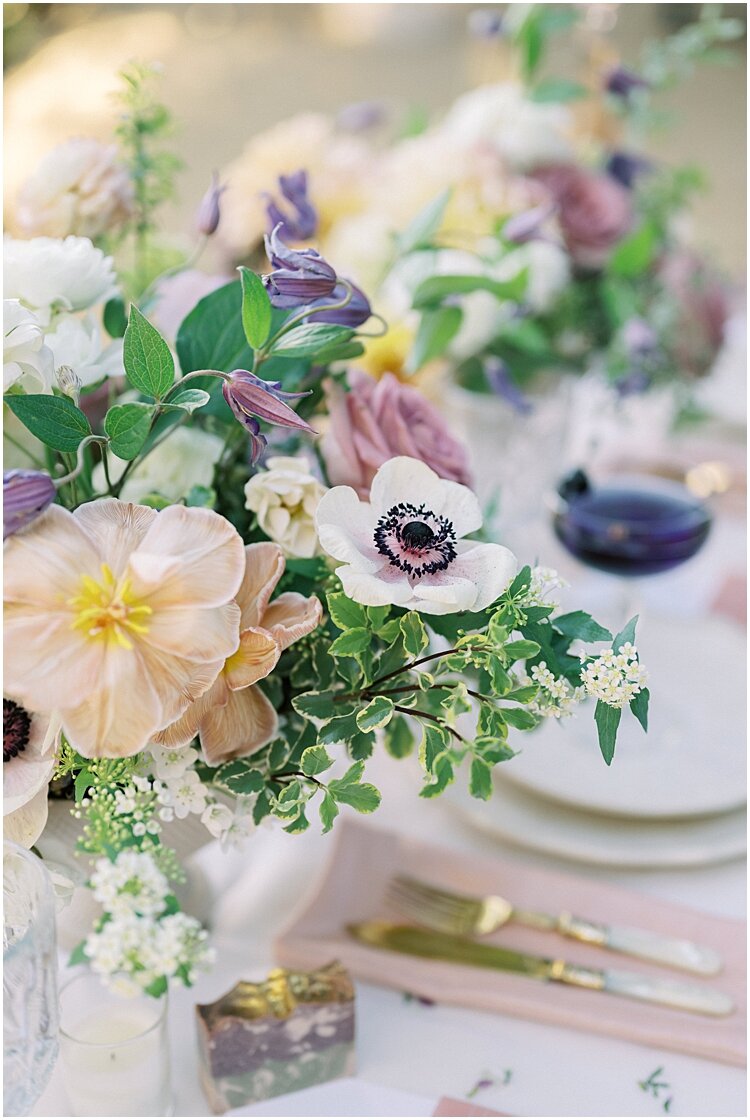 romantic white and purple wedding centerpieces