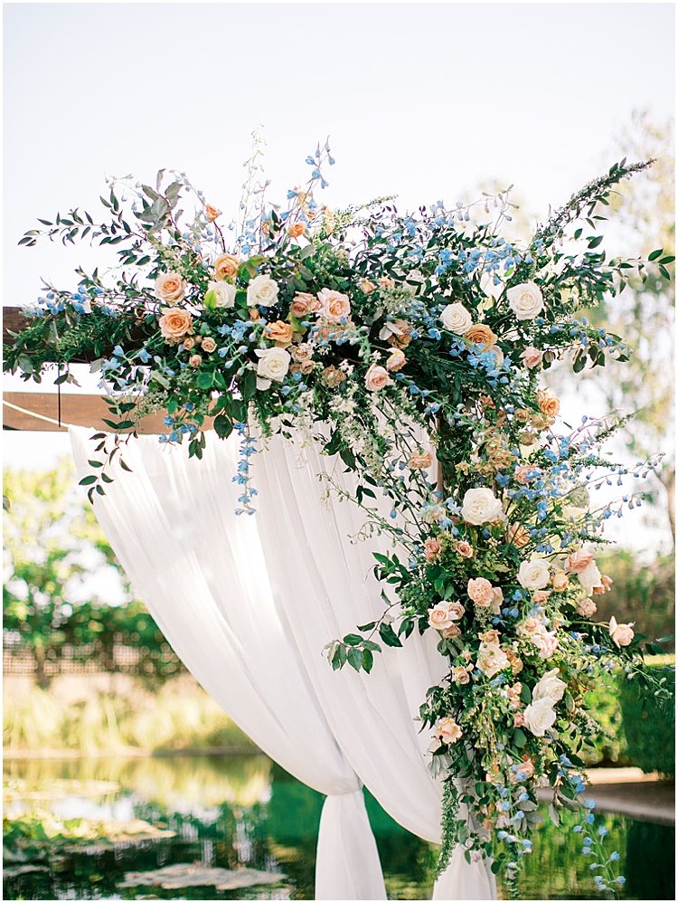 floral curtain ceremony arch