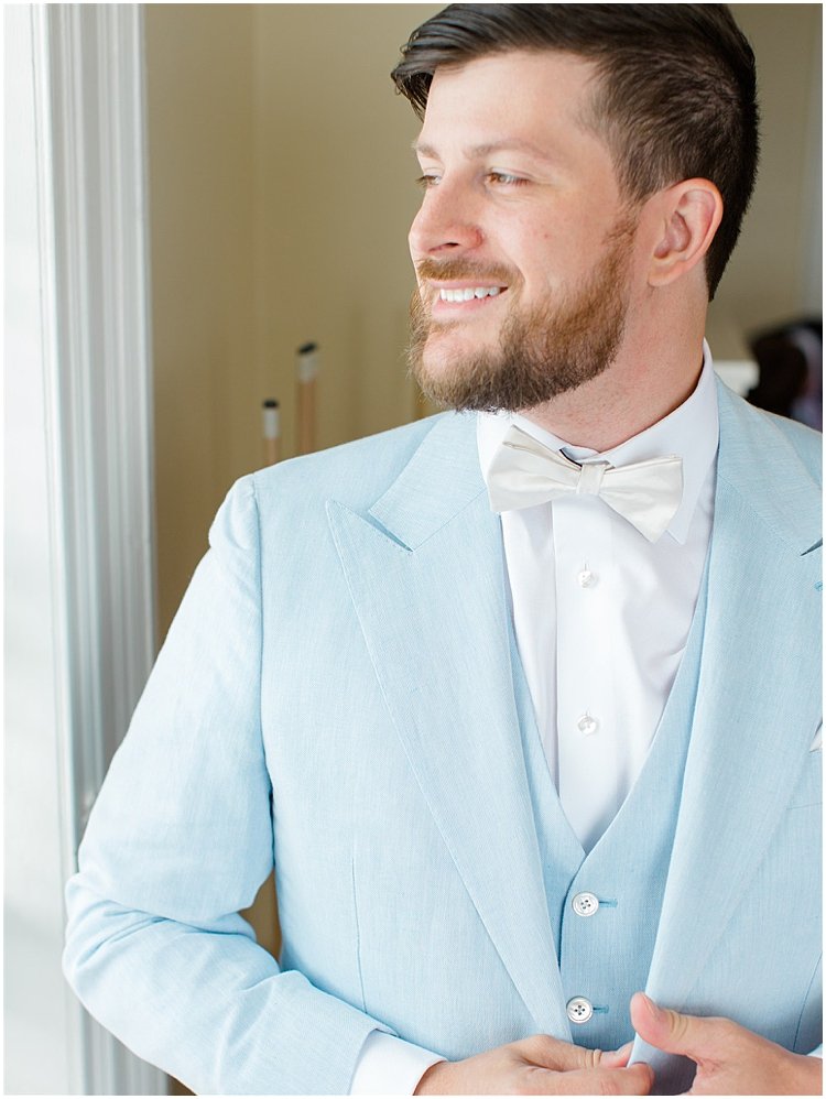 soft blue groom's suit.jpg