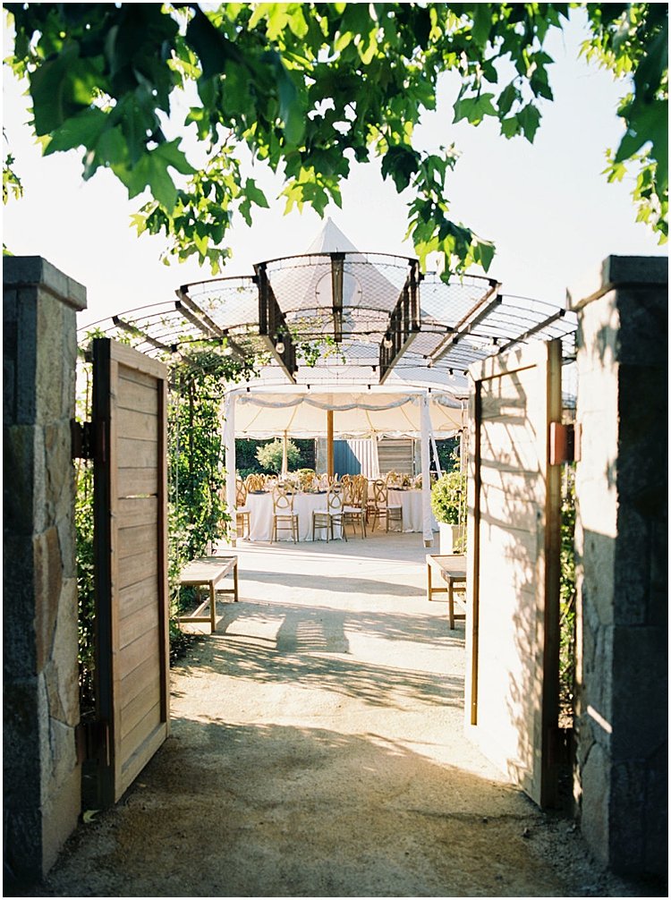 tented garden wedding entrance