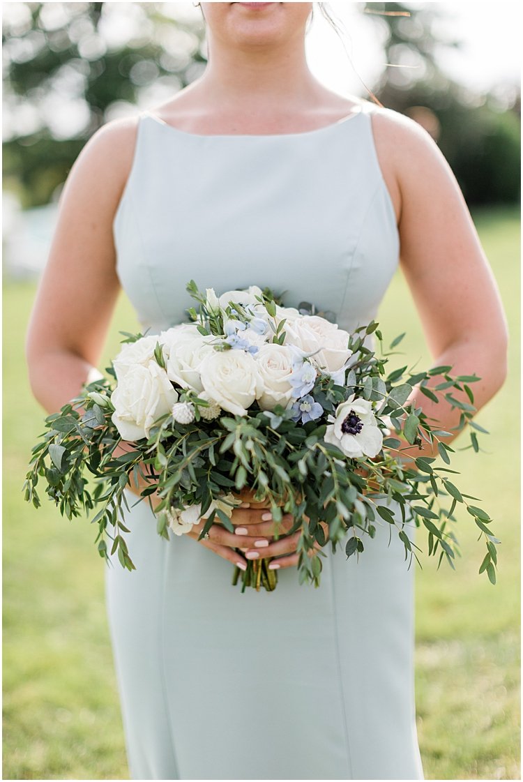 seafoam green bridesmaid dress and bouquet