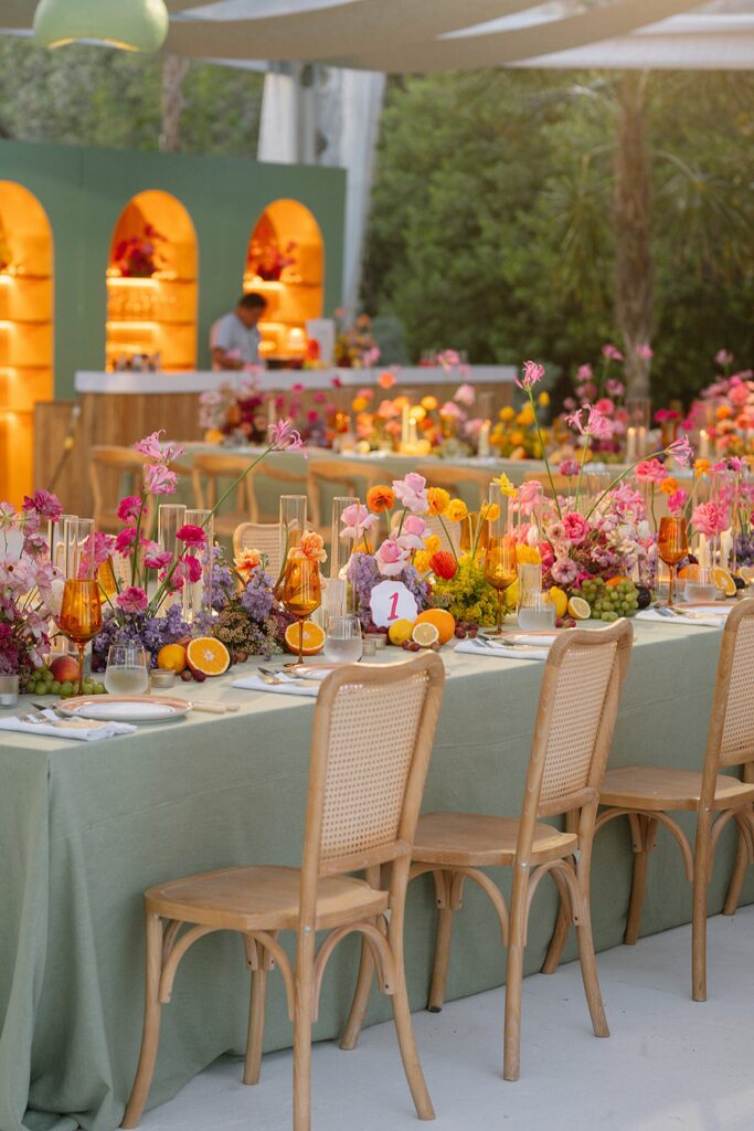 Colorful floral centerpieces at wedding reception table