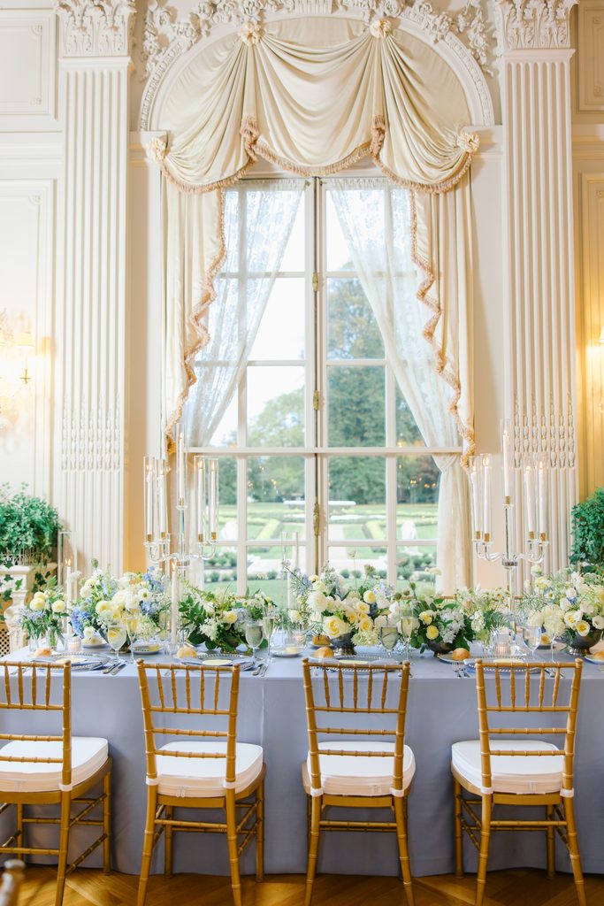 wedding reception chairs and dinner table
